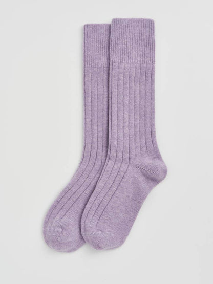 Elegant Merino bed socks, effortlessly blending luxury and functionality, designed for a cozy and comfortable bedtime experience.