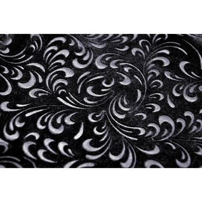 Side profile of the Dark In Love velvet midi skirt with concealed zip, highlighting its elegant design and luxurious lace details.