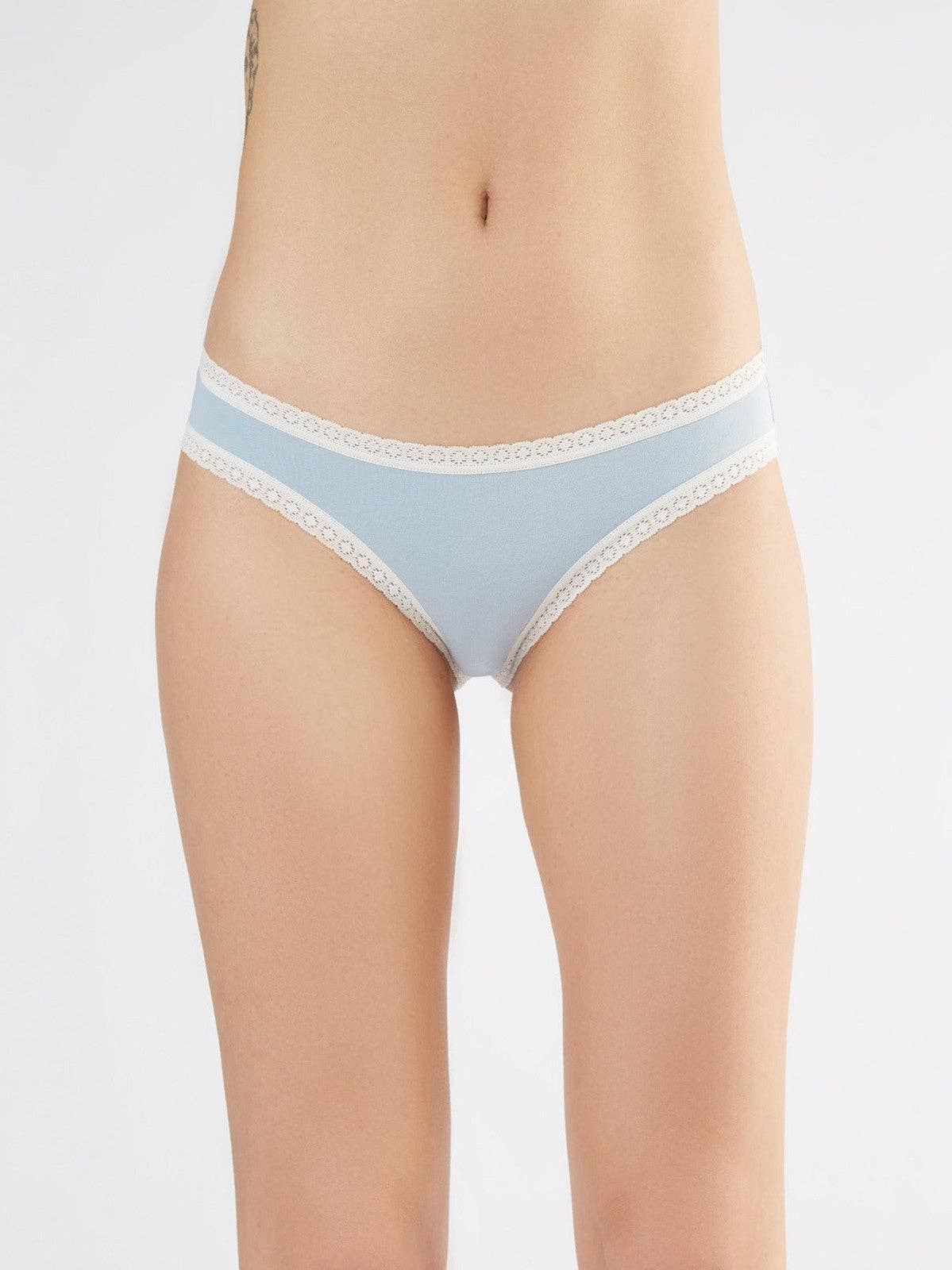 Luxury organic cotton women's briefs with soft lace trim, elegantly displayed on a neutral background.