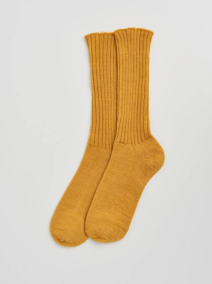 Luxury chunky ribbed mohair socks, warm and odour-resistant, handcrafted in the UK, perfect for cosy winter evenings.