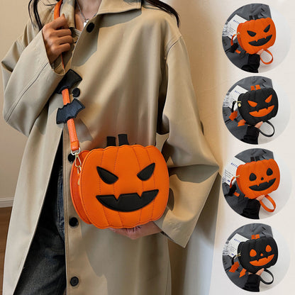 2023 Halloween Bags Funny Pumpkin Cartoon Shoulder Crossbody Bag featuring playful bat embellishments, elegantly styled in a luxurious outfit.