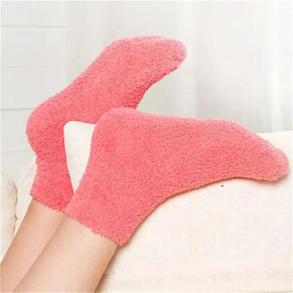 Luxurious Women's Bed Socks Pure Color Fluffy Warm Winter Christmas in soft pink, providing ultimate warmth and comfort for a lavish lounging experience.