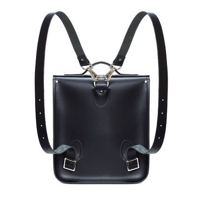 Elegant Handmade Leather City Backpack in Navy Blue with signature red and white stripes, ideal for urban professionals, accommodating laptops and tablets up to 13 inches.