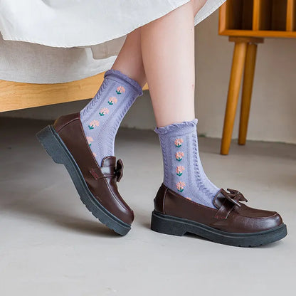 Elegant floral-patterned socks for women from Dazzling Dreams Studio, ideal for parties and weddings, combining style with comfort and durability.