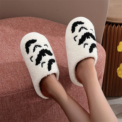 Top view of the white Funny Bat Slipper Halloween Pumpkin Flat Indoor House Shoes, showcasing soft plush texture and charming bat designs, suitable for Halloween celebrations.
