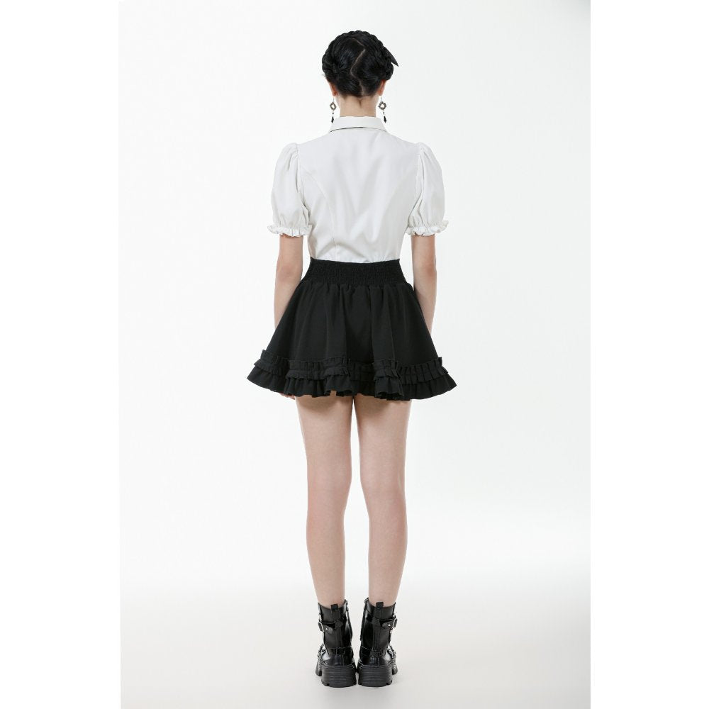 Back zipper closure of the Dark in Love black high-waisted ruffled mini skirt, exemplifying craftsmanship and a structured silhouette perfect for modern gothic attire.