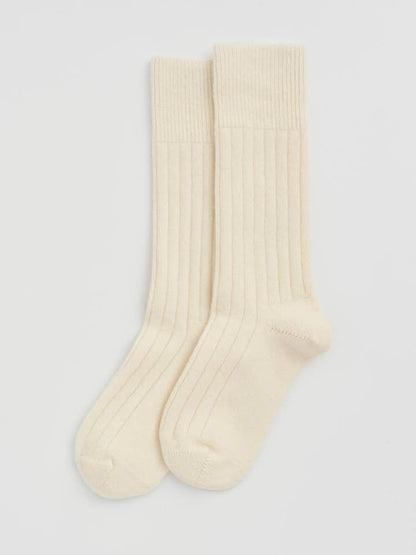 Luxury Merino bed socks in soft, cosy design, showcasing their moisture-wicking and odour-resistant features.
