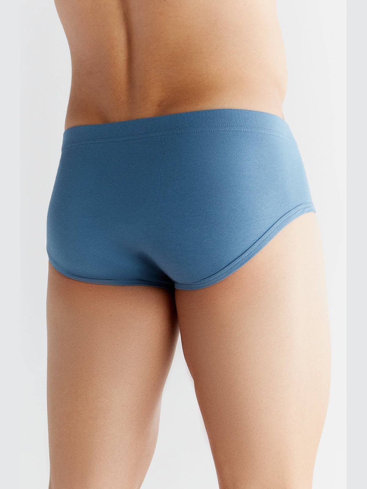 Luxury organic cotton briefs for men showing elastic waistband, eco-friendly and comfortable design by Earth Wardrobe.