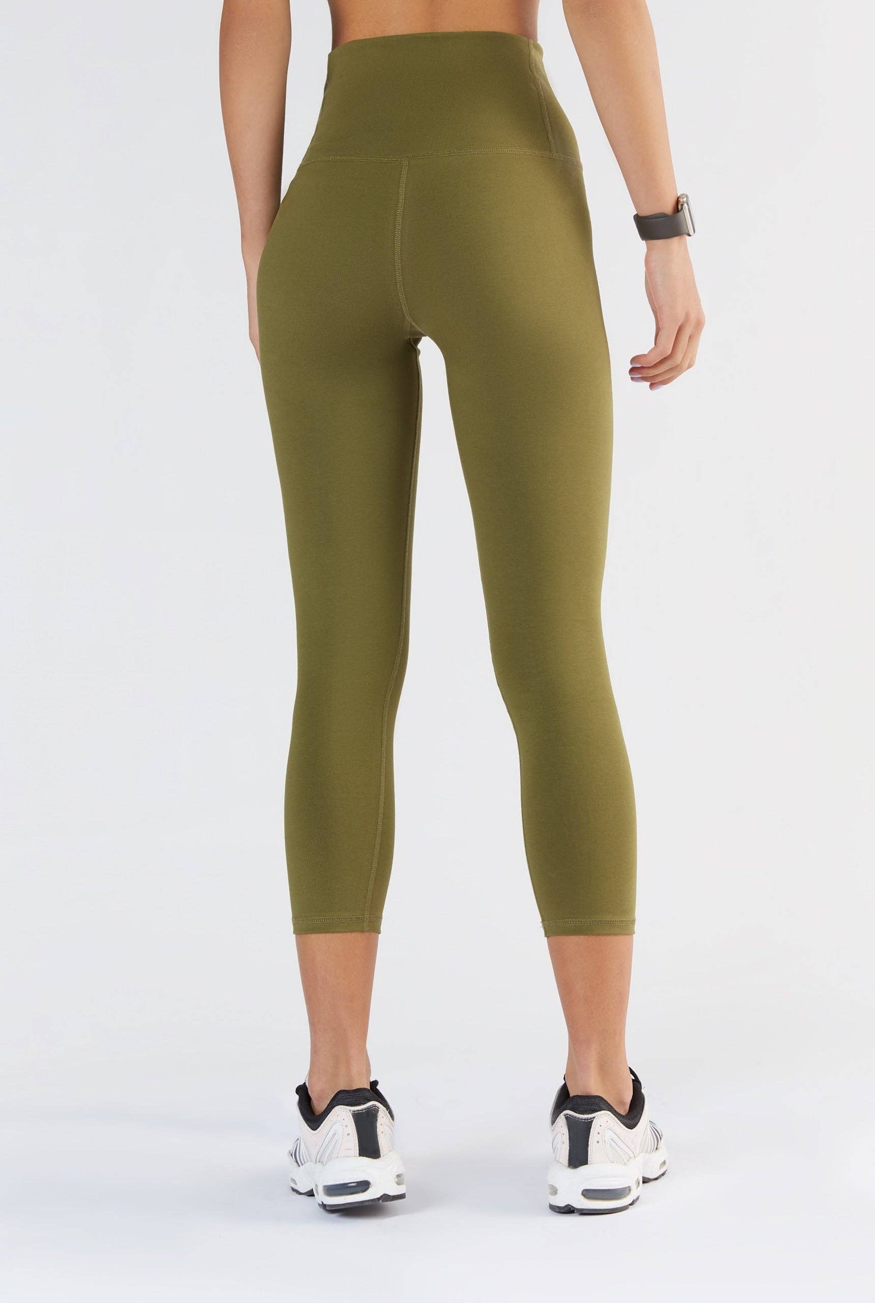 Luxury organic leggings displayed on a mannequin, emphasising the chic high-rise fit and snug second-skin sculpted look.