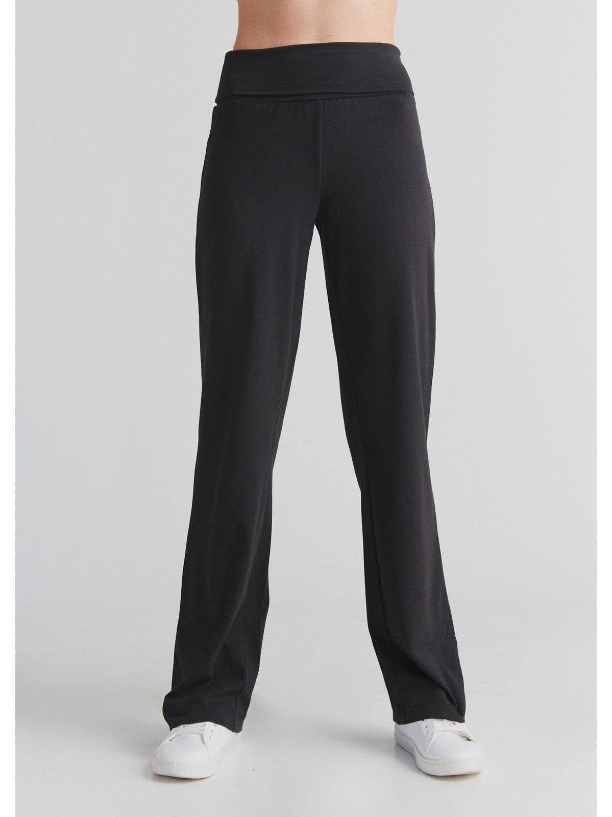 Elegant display of wide waistband organic cotton leggings, emphasising comfort and a chic silhouette for modern wear.