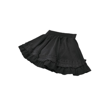 Charming black Lolita-inspired mini skirt displayed on a mannequin, highlighting the playful sweetheart waistband and soft volume.