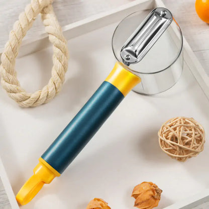 Stylish vegetable peeler displayed on a decorative tray, featuring a stainless steel blade and a comfortable handle, ideal for luxury culinary experiences.