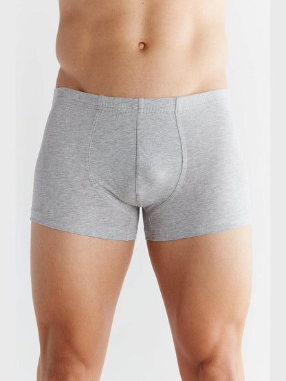 Close-up of luxurious organic cotton boxer shorts, highlighting the comfortable cotton-covered waistband.