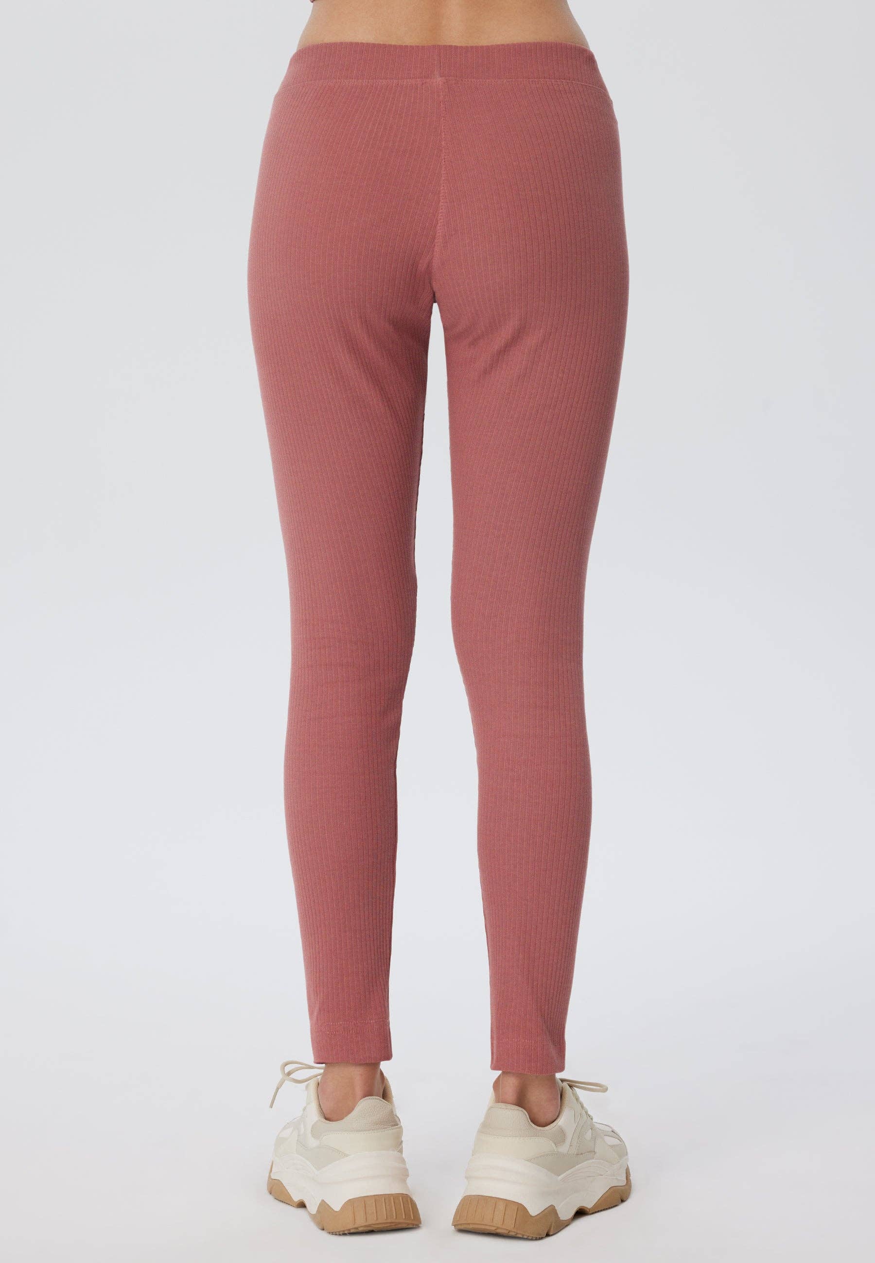 Close-up view of luxurious ribbed texture on organic cotton leggings for women, showcasing the premium quality fabric.