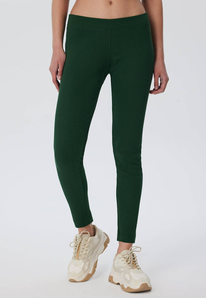 Luxury organic cotton ribbed leggings for women in elegant black, designed for a snug fit with a soft elasticated waist.