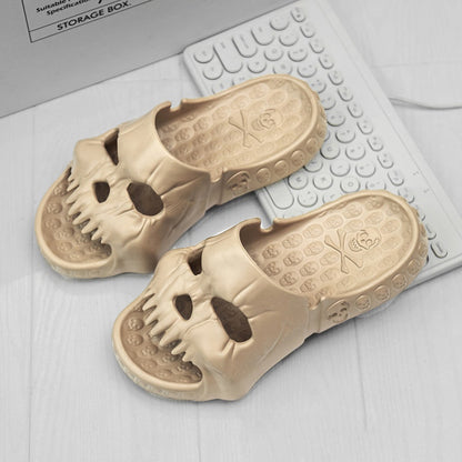 Elegant pair of Personalized Skull Design Halloween Slippers on a stylish workspace, showcasing a unique skull design for trendsetting beach and home wear.