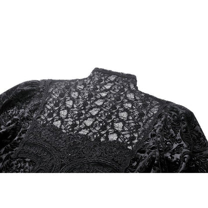 Stylish Dark In Love Cyra Gothic Velvet Top modelled against a striking backdrop, illustrating its elegant silhouette and luxurious texture.