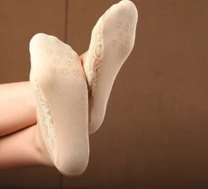 A fashionable flat lay of Dazzling Dreams Studio's three pairs of elegant lace socks, featuring their attractive colour options and non-slip silicone grip.