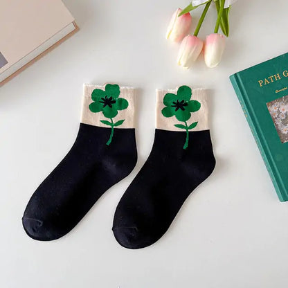 Stylish presentation of Kawaii Women's Frilly Ruffle Socks by Dazzling Dreams Studio, perfect for pairing with elegant outfits, embodying the chic Lolita fashion trend.