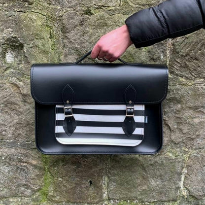 Close-up of Gothic Striped Leather Satchel strap and buckle, highlighting premium quality leather and sophisticated details for a chic and versatile accessory.