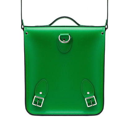 Luxury handmade green leather city backpack by Zatchels showcasing vibrant leather exterior, ideal for tablets and laptops, designed for urban professionals and students.