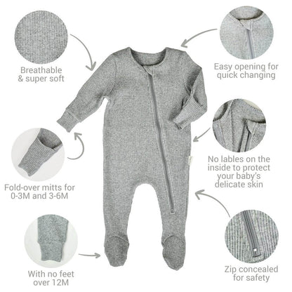 DreamBuy Sweet Pink Zip Sleepsuit styled with accessories, making a delightful gift option for baby showers or birthdays.