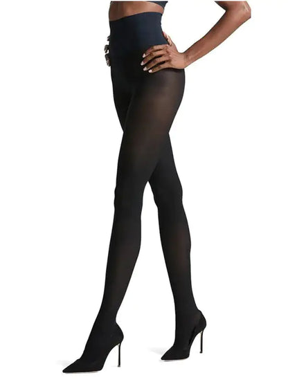 Women's Secret Sheer Plush Lined Tights showcased elegantly, featuring a sheer exterior and plush lining for warmth, ideal for chilly days. Perfect for adding luxurious style to any outfit.