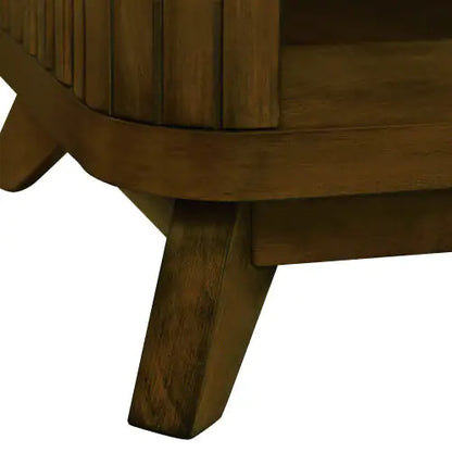 Close-up of the sturdy legs and textured finish of a walnut wooden coffee table, highlighting its quality craftsmanship and elegant design.