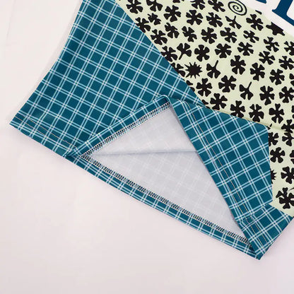 Model wearing the Sweet Legend Women's Vibrant Print Cropped Tee by Dazzling Dreams Studio, styled with high-waisted jeans for a trendy daytime outfit.