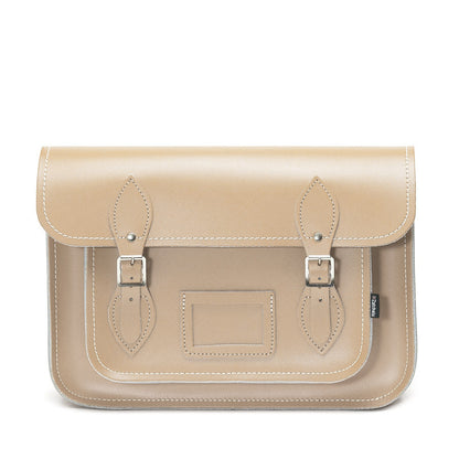 Luxury handmade leather satchel in iced coffee colour with adjustable cross-body strap, showcasing superior craftsmanship and style.