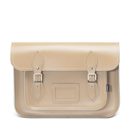 Luxury handmade leather satchel in iced coffee colour with adjustable cross-body strap, showcasing superior craftsmanship and style.