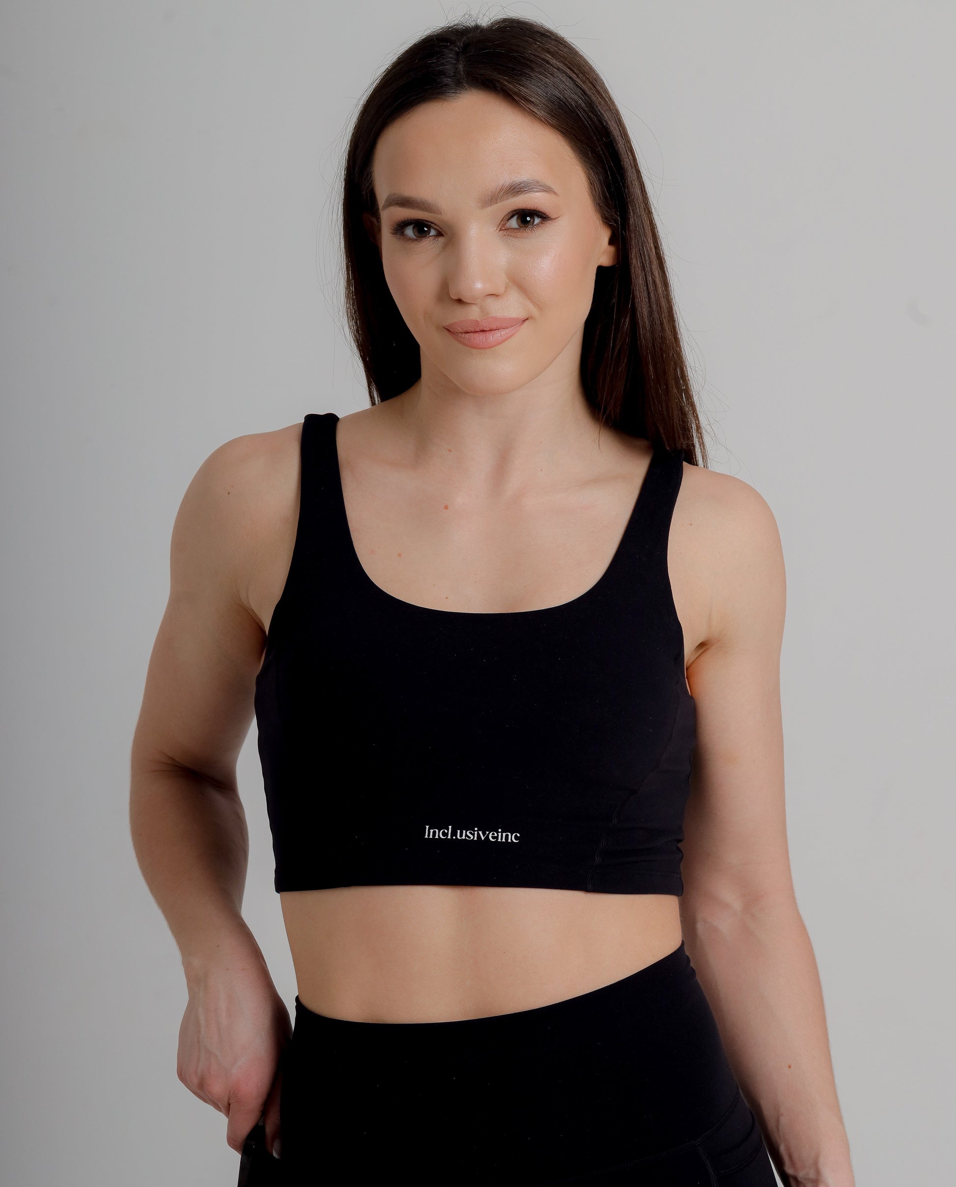 Incl.usiveinc Active Black Sports Bra features high support with breathable fabric, perfect for intense workouts.