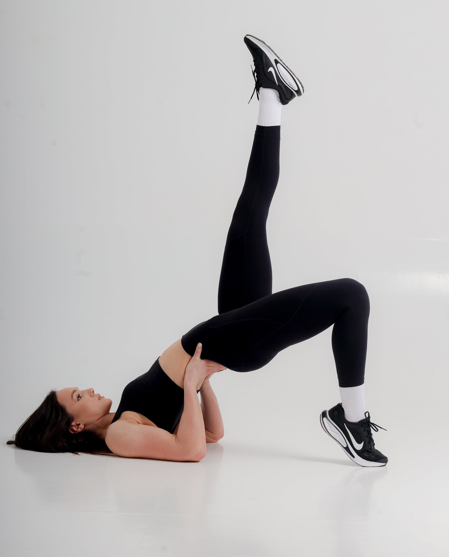 Close-up of the luxurious quick dry fabric of Premium Active Leggings from Incl.usiveinc, showcasing breathability and four-way stretch.