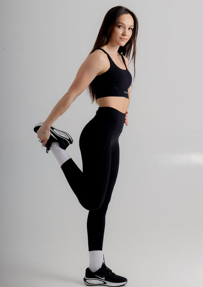Elegant high-waisted leggings in black from Incl.usiveinc, showcasing a flattering fit and breathability for ultimate comfort.