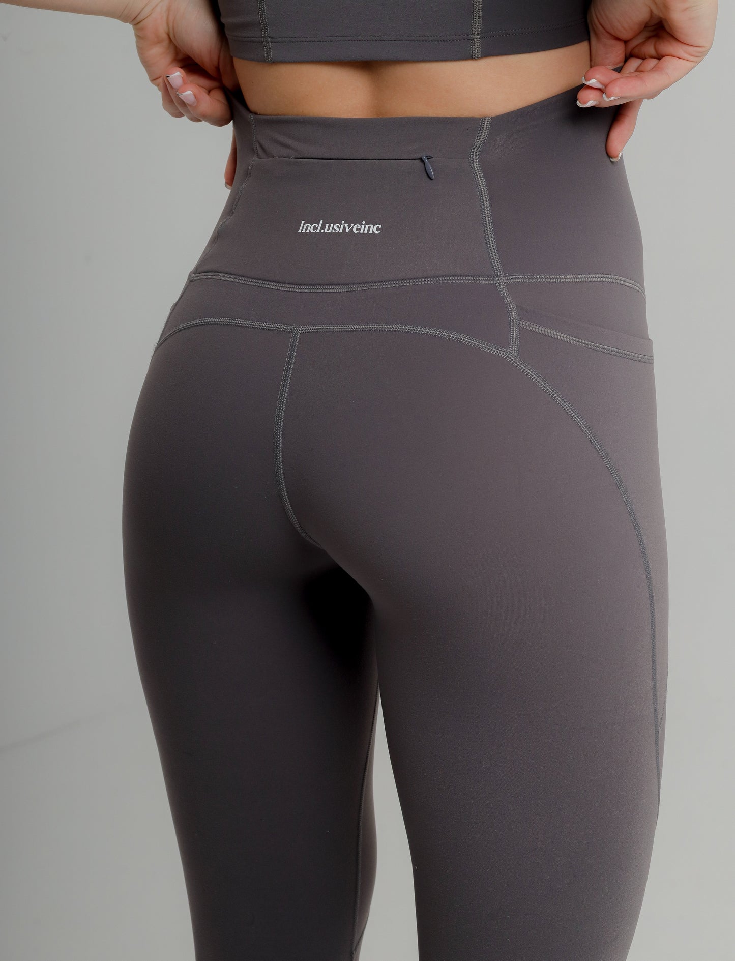 High quality nylon and spandex multi sport leggings by Incl.usiveinc, designed for shape retention and a secure fit.