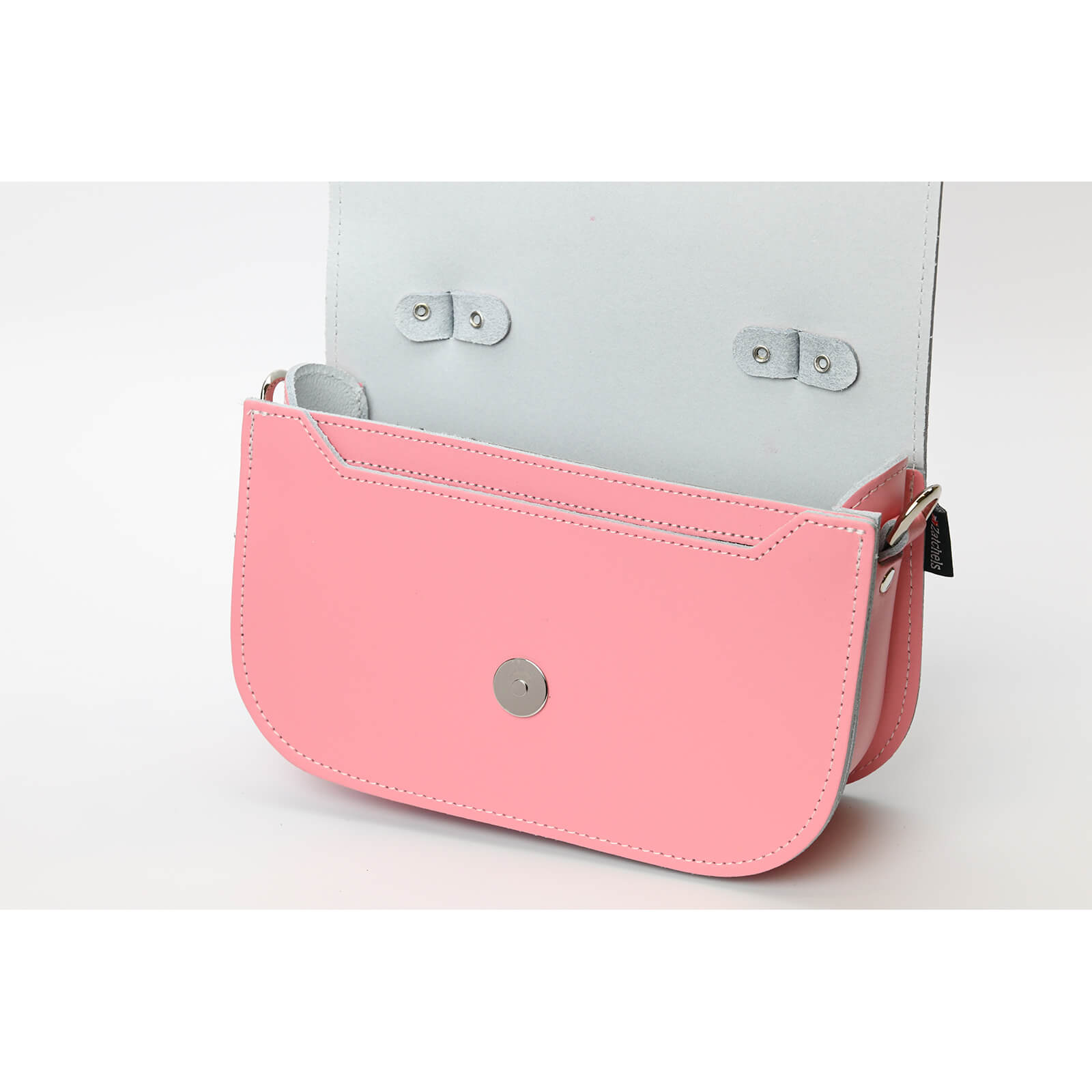 Aura Pastel Pink Handmade Leather Handbag showcasing elegant craftsmanship with detachable strap and sleek design, ideal for any stylish outfit.