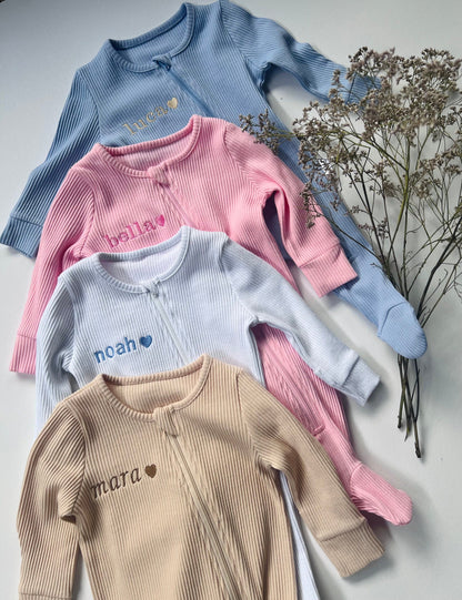 DreamBuy luxury zip sleepsuit in a warm, gender-neutral colour, ideal for babies aged 0-36 months, providing ultimate comfort.
