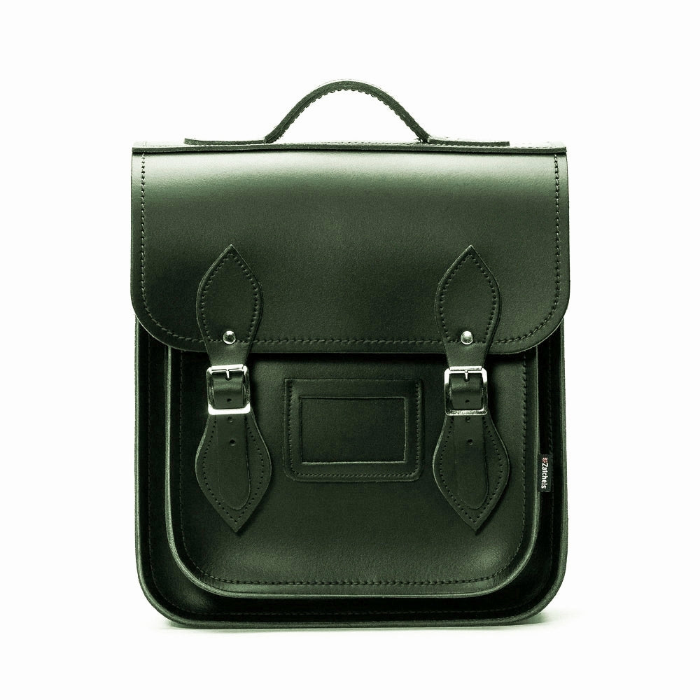 Handmade Ivy Green Leather City Backpack showcasing exquisite craftsmanship with premium leather and sleek silver nickel buckles, designed for stylish urban living, perfect for tablets and laptops up to 13 inches.