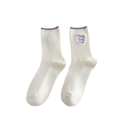 Single pair of Elegant White Embroidered Socks for Women featuring Unique Japanese-Style Font Design in lovely purple detail on a minimalist background.