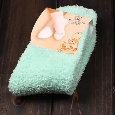 Luxurious Women's Bed Socks in soothing mint green colour, crafted from pure coral fleece for ultimate warmth and comfort, perfect for winter lounging.