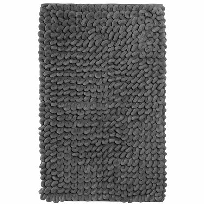 Non-slip backing of the Jumbo Loop Bath Mat by OLIVIA ROCCO demonstrated on stylish bathroom flooring, ensuring stability and safety.