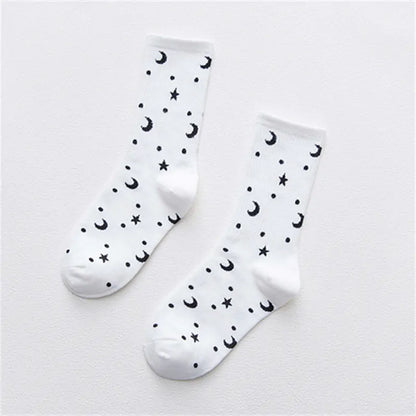 Dazzling Dreams Women's/Girl's Street Sports Socks featuring a stylish black and white design with celestial moon and star patterns, perfect for adding a luxurious touch to your streetwear.