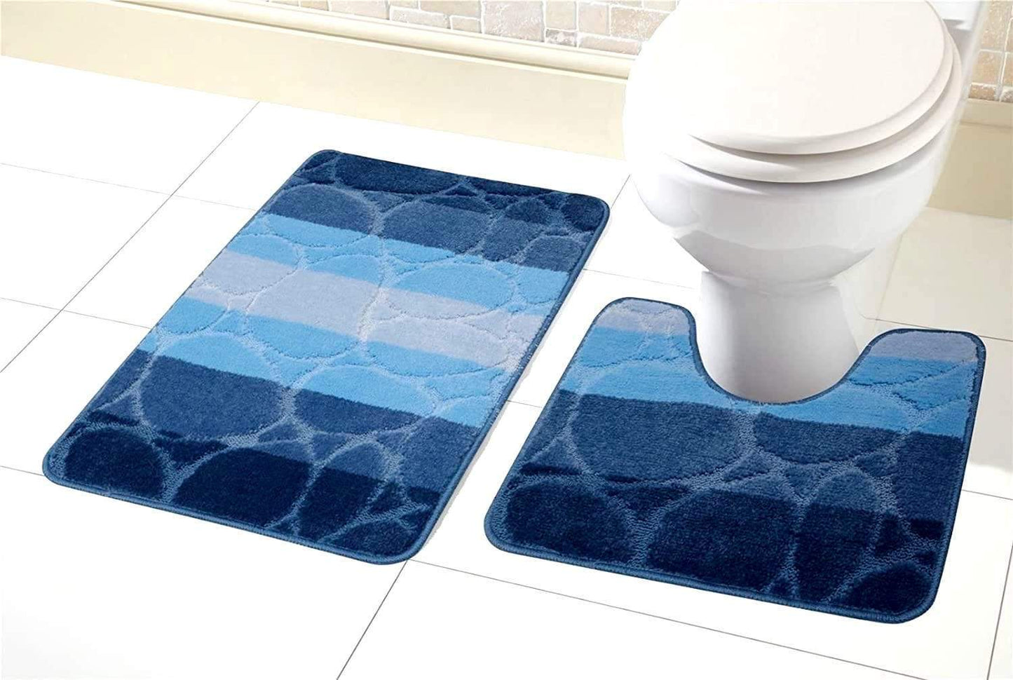 Kaya Ultra Soft Non-Slip Bath Mat Set featuring luxurious bold stripes, ultra-absorbent and plush texture in an inviting bathroom setting.