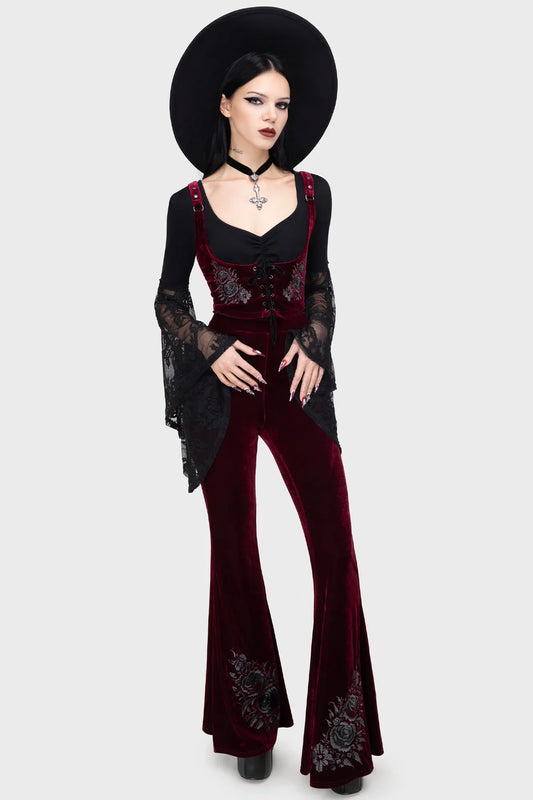 Stylish Killstar A Devil's Rose Flares with dramatic flared hems and elastic waistband, beautifully showcasing the fitted silhouette and rich velvet texture.