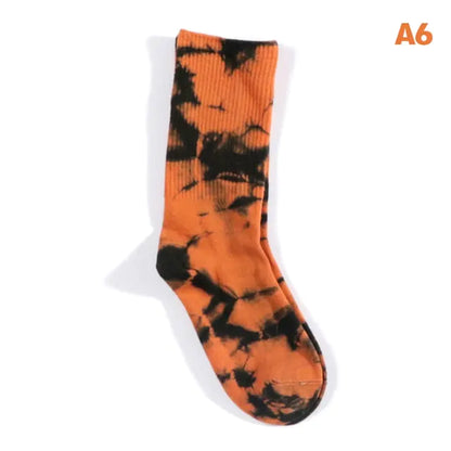 Luxurious Women's Tie-Dye Middle Tube Socks showcasing an eye-catching orange and black pattern, ideal for vibrant comfort and all-day style.