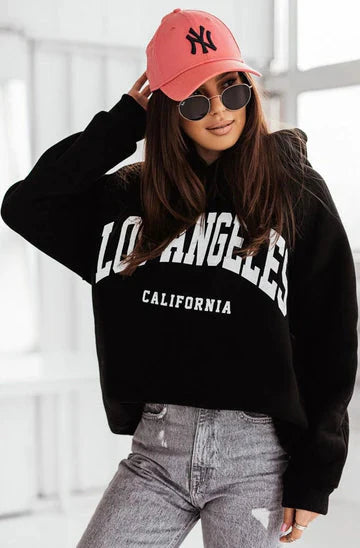 Luxury oversized hoodie featuring 'Los Angeles California' print in soft fleece, perfect for casual wear.