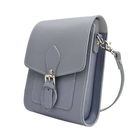 Elegant Handmade Lilac Grey Leather Festival Phone Bag showcasing its luxurious texture and stylish design, complete with adjustable strap and magnetic closure.