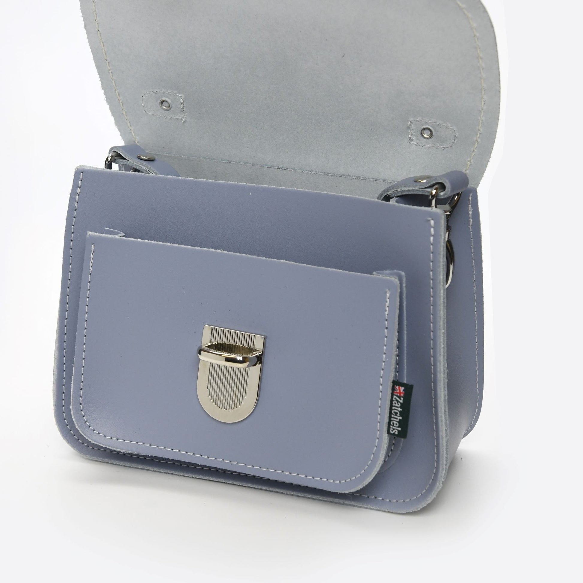 Luna Bag displayed as a versatile crossbody and clutch, demonstrating its stylish adaptability for day or night events.