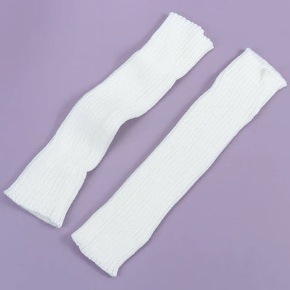 Two pairs of Luxury Long Socks Women's Leg Warmers in pristine white, elegantly presented to emphasise their soft texture and fashionable silhouette.