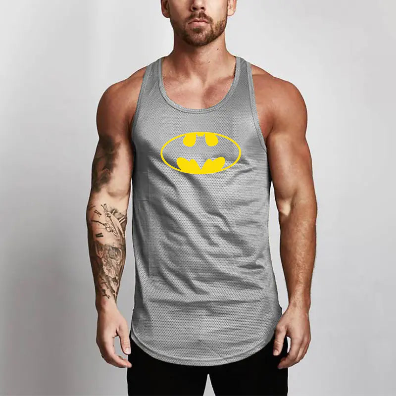 Sophisticated grey men's Batman performance mesh tank top featuring a prominent yellow Batman logo, designed for ultimate comfort during workouts.